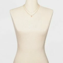 Best deal 😍 Filigree Disc with Glitter Layered Necklace - A New Day™ Gold 🔔