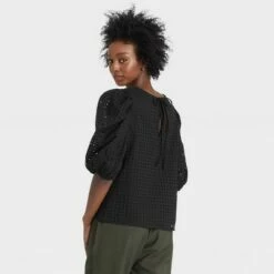 Coupon ✔️ Women's Short Puff Sleeve Eyelet Top - A New Day™ 🎉